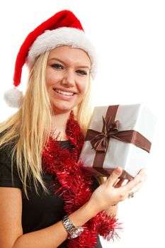 portrait of blonde woman with christmas hat and present over white background