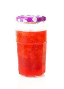 Pot of plums jam over white background