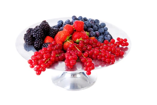 Bowl with fresh healthy fruit over white background
