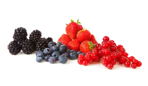 Healthy fresh summer fruit over white background