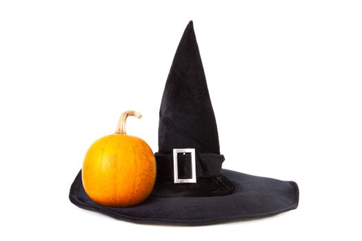Black fabric witch hat with pumpkin for Halloween isolated on white background