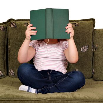 little girl reading a book