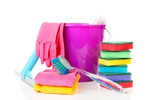 couple of colorful cleaning equipment over white background