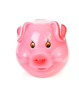 Pink piggy bank isolated on white background 
