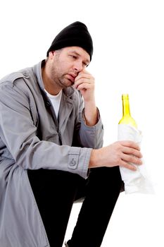 male homeless tramp with empty bottle over white background