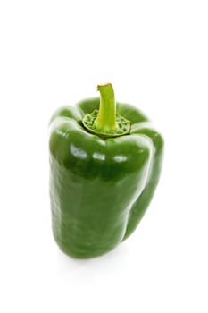 one fresh green paprika over white background