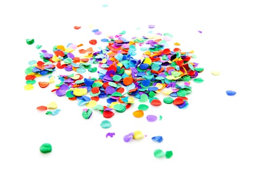 pile of colorful confetti over white background