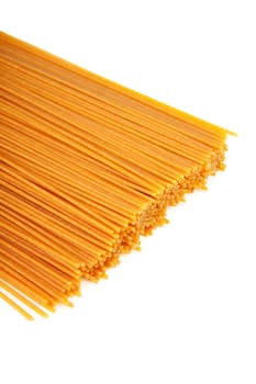 bundle of raw spaghetti over white background