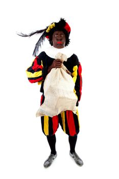 Zwarte piet ( black pete) typical Dutch character part of a traditional event celebrating the birthday of Sinterklaas in december over white background with heavy bag