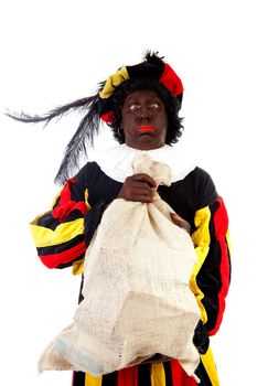 Zwarte piet ( black pete) typical Dutch character part of a traditional event celebrating the birthday of Sinterklaas in december over white background with heavy bag 