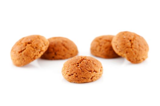 Couple of of pepernoten (ginger nuts) sweets for typical Dutch festivity at 5 december over white background