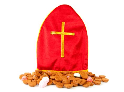 Mitre also know as mijter of Sinterklaas and pepernoten, part of typical Dutch tradition, isolated on white background
