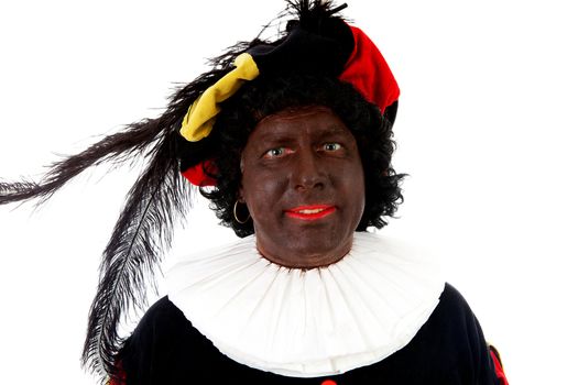 Zwarte piet ( black pete) typical Dutch character part of a traditional event celebrating the birthday of Sinterklaas in december over white background