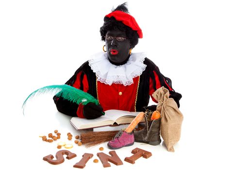 Zwarte piet ( black pete) typical Dutch character part of a traditional event celebrating the birthday of Sinterklaas in december over white background