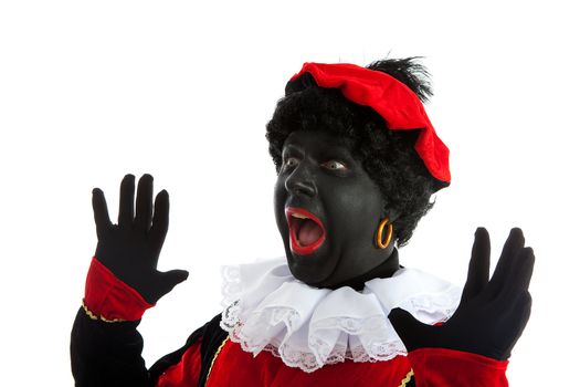 Zwarte piet ( black pete) typical Dutch character part of a traditional event celebrating the birthday of Sinterklaas in december over white background is looking surprised
