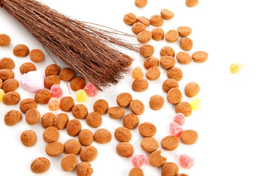 Roe of black Pete ( zwarte Piet) and pepernoten ( ginger nuts) over white background