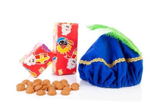 Hat of black pete ( zwarte Piet), gifts and pepernoten ( ginger nuts) for typical Dutch event in december