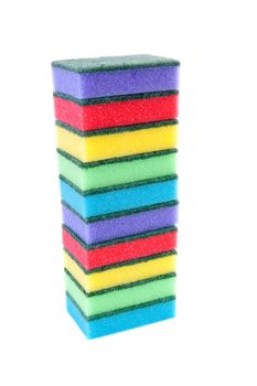 Pile of colorful sponge scourer over white background