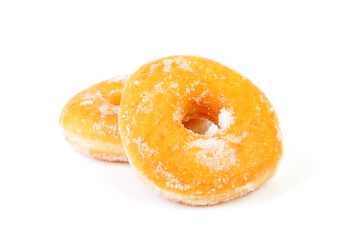 two sugared delicious donuts over white background