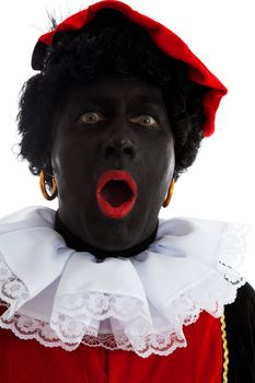 Portrait of surprised Zwarte piet ( black pete) typical Dutch character part of a traditional event celebrating the birthday of Sinterklaas in december over white background