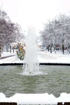 fountain in white winter setting