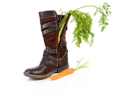 Boot with carrot for Dutch traditional feast: Sinterklaas over white background