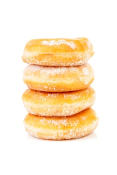 Four stacked sugared delicious donuts over white background