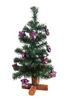 plastic christmas tree with purple stars isolated on white background 
