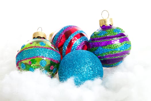 Colorful glitter Christmas balls over white background