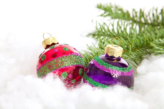Colorful glitter Christmas balls over white background