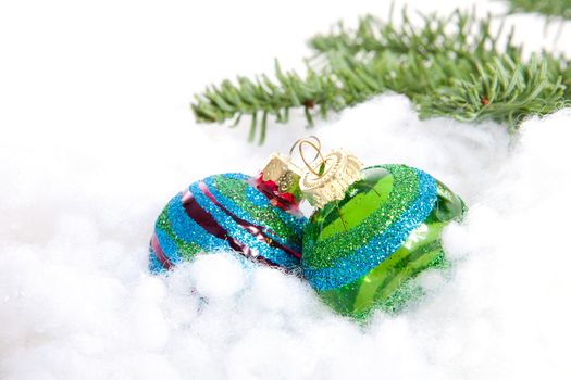 Colorful glitter Christmas balls over white background