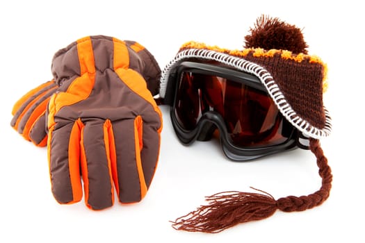ski goggles, hat and gloves isolated on white background