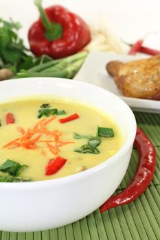 Curry soup with colorful vegetables and chicken