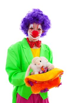 Girl Clown and magical hat over white background