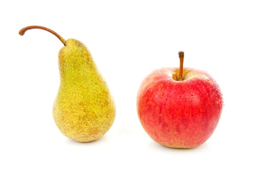 fresh pear and apple with water drops over white background