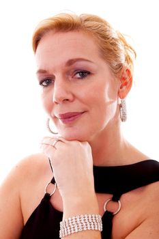 Portrait of middle-aged woman with jewelry over white background