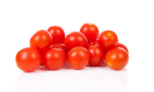 Pile of cherry tomatoes over white background