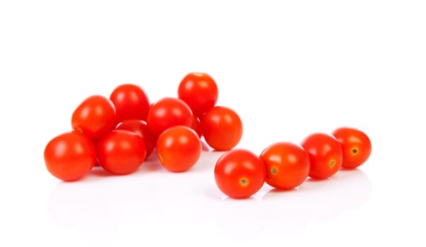 Pile of cherry tomatoes over white background