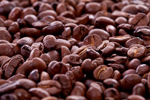 Background of roasted coffee beans in closeup