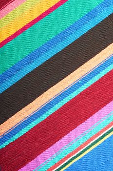 New textile fabric in multicolored stripes as a natural background