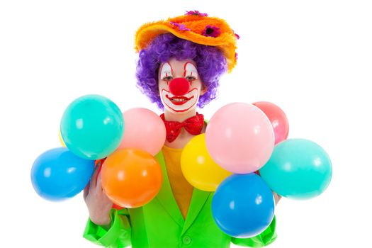 child dressed as colorful funny clown with balloons over white background