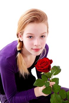young girl with red rose over white background