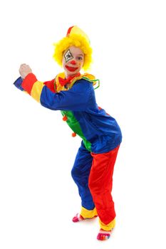 child dressed as colorful funny clown over white background