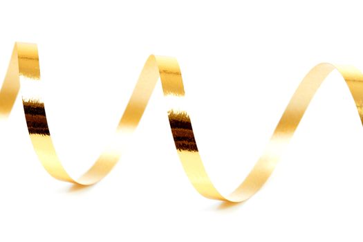 Golden curly streamer over white background