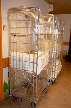 cart with linens for bed in hospital