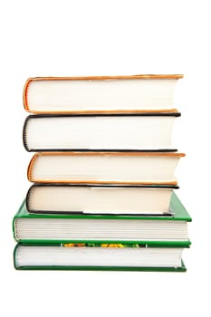 Six books stacked over white background