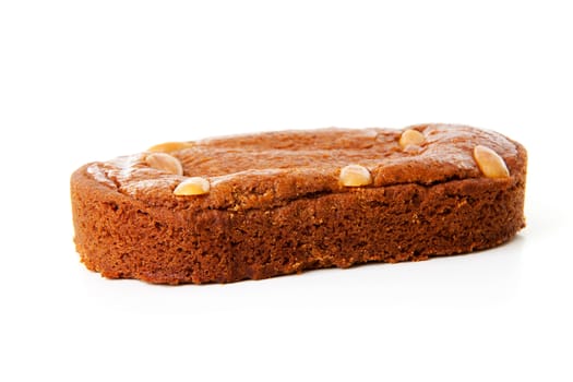 Dutch filled gingerbread cake over white background 
