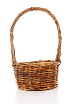 Empty cane basket isolated on white background 
