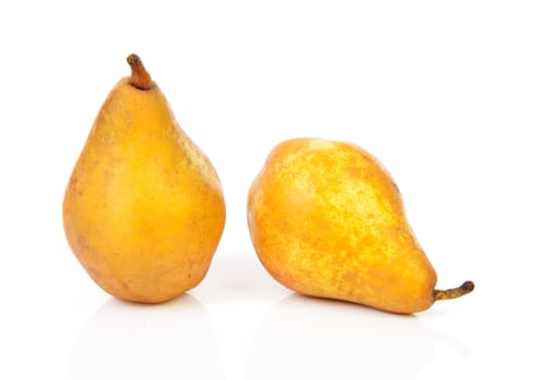Two yellow fresh pears over white background