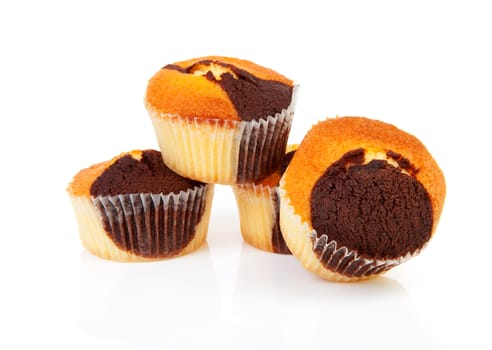 Four delicious cupcakes isolated on white background